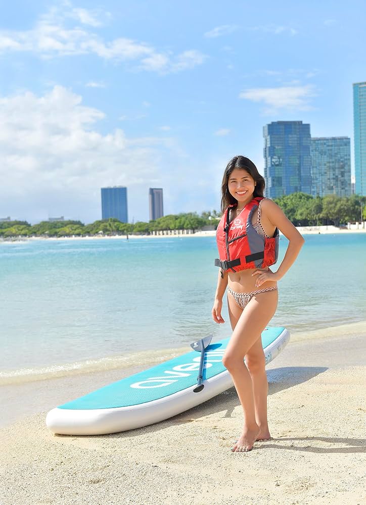 Woman sup yoga. Happy sporty woman practising yoga pilates on paddle supsurfboard. Female stretching doing workout on sea water. Modern individualfemale hipster outdoor summer sport activity.の素材FY310202415719ストックフォトの Qlean