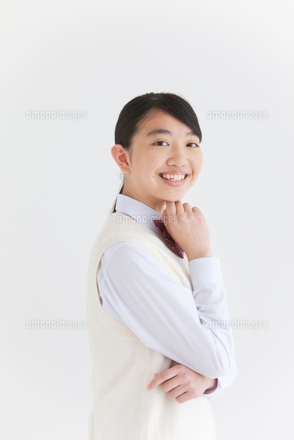 あごに手を当てるの写真素材 - PIXTA